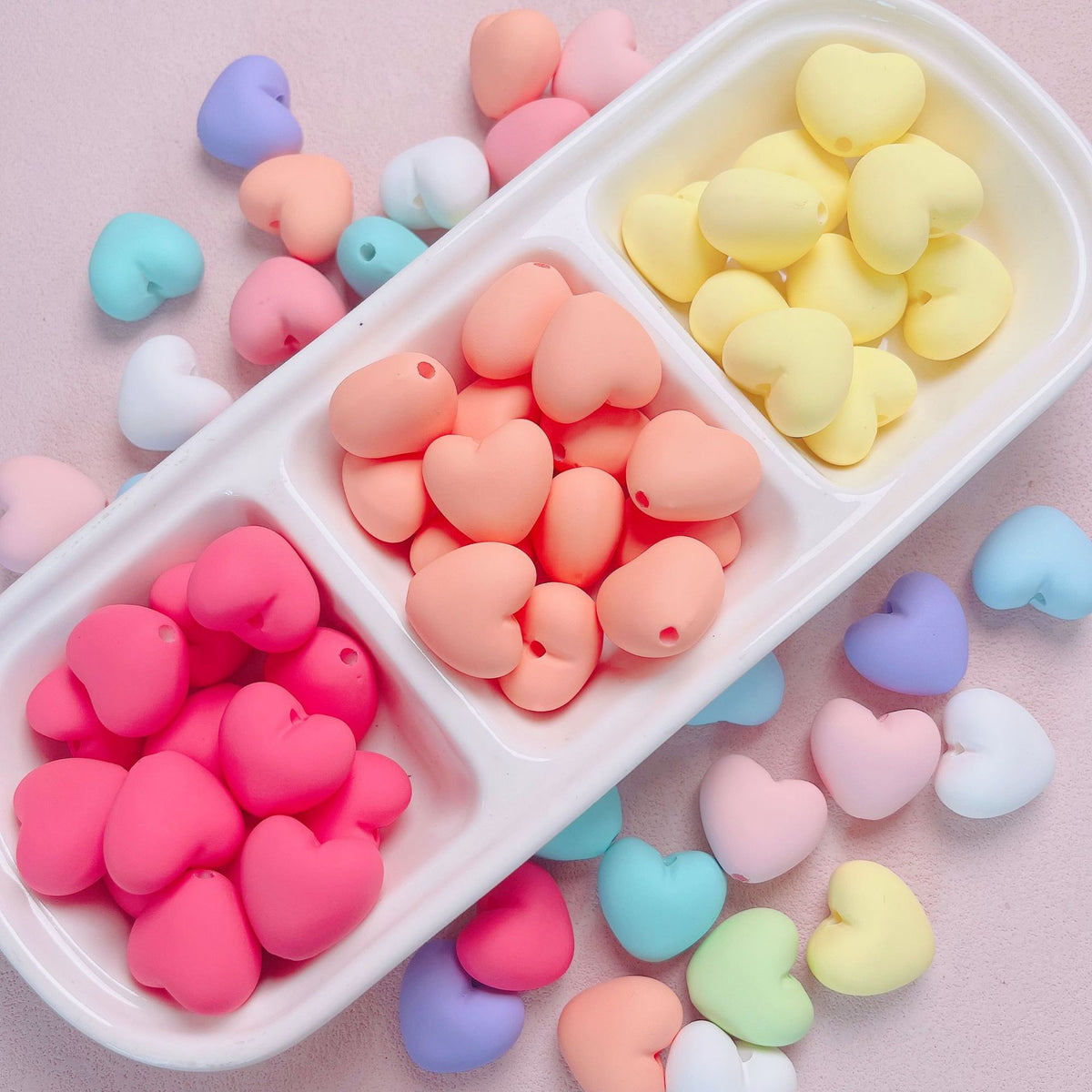 Acrylic macaron with hand-painted heart-shaped beads