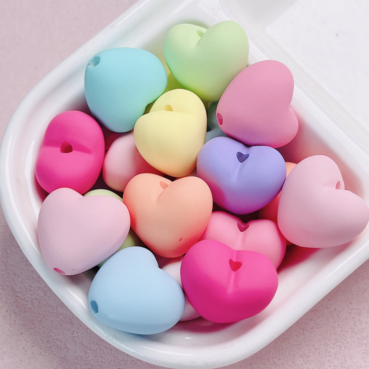 Acrylic macaron with hand-painted heart-shaped beads