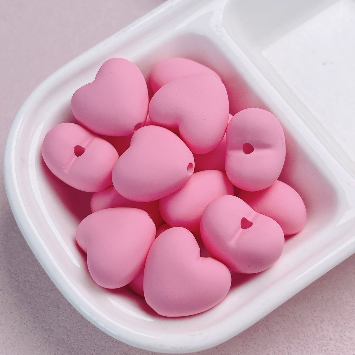 Acrylic macaron with hand-painted heart-shaped beads
