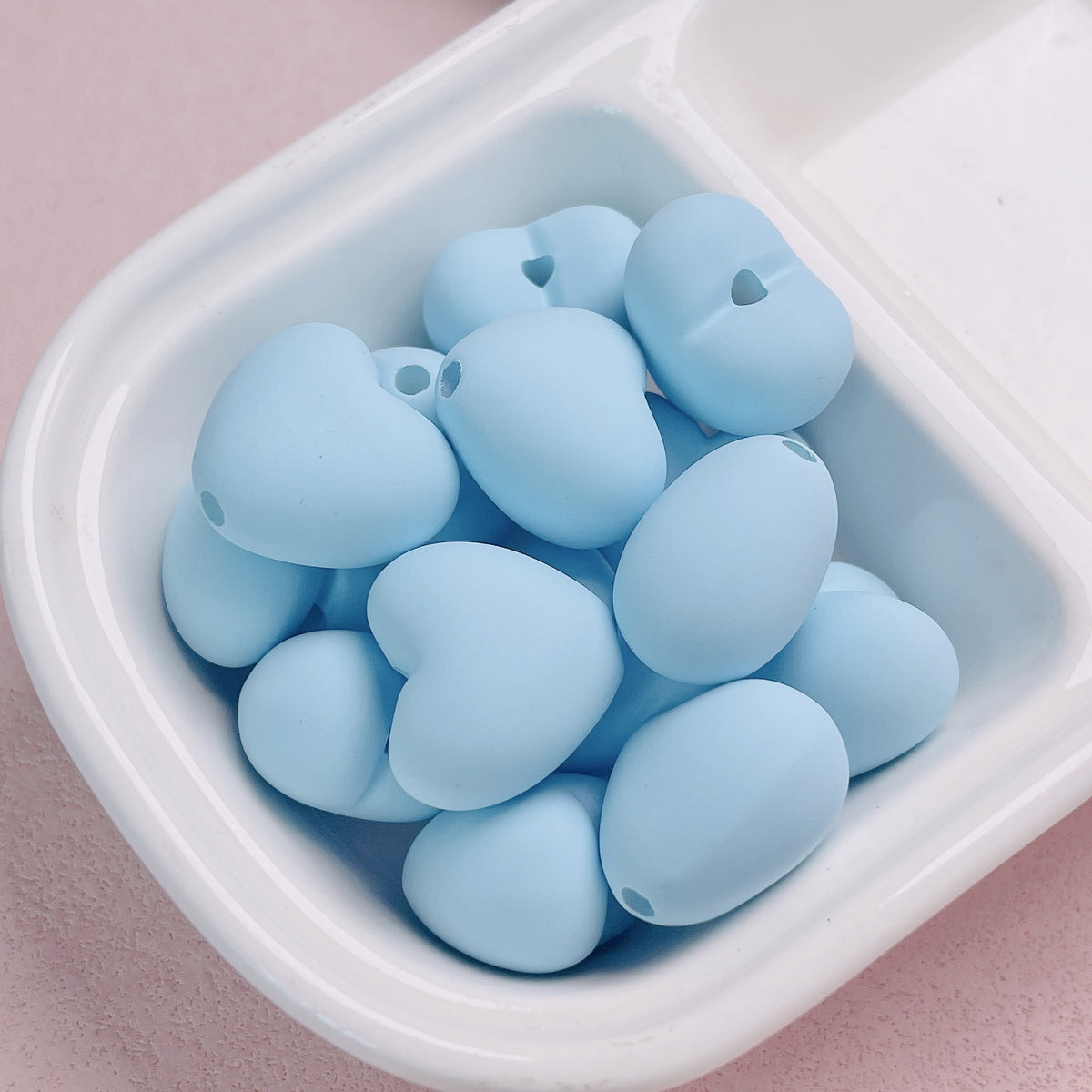 Acrylic macaron with hand-painted heart-shaped beads